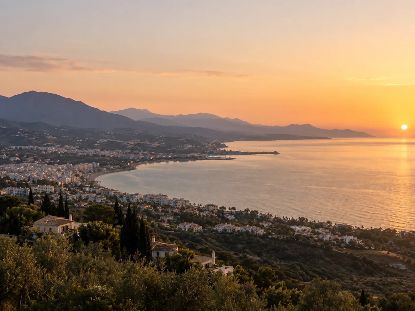 Golden-hour view across the Mediterranean coast near Estepona