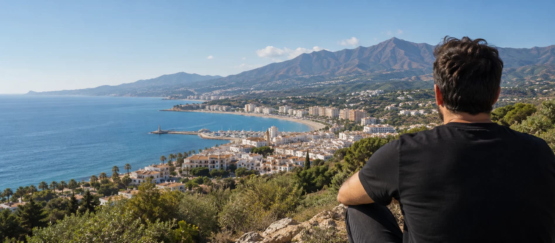 Fictional person overlooking the Mediterranean coast near Estepona
